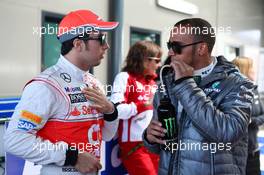 (L to R): Sergio Perez (MEX) McLaren with Lewis Hamilton (GBR) Mercedes AMG F1. 17.03.2013. Formula 1 World Championship, Rd 1, Australian Grand Prix, Albert Park, Melbourne, Australia, Race Day.