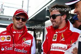 (L to R): Felipe Massa (BRA) Ferrari with Fernando Alonso (ESP) Ferrari and Pastor Maldonado (VEN) Williams. 17.03.2013. Formula 1 World Championship, Rd 1, Australian Grand Prix, Albert Park, Melbourne, Australia, Race Day.