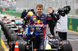 Pole sitter Sebastian Vettel (GER) Red Bull Racing RB9 celebrates in parc ferme. 17.03.2013. Formula 1 World Championship, Rd 1, Australian Grand Prix, Albert Park, Melbourne, Australia, Race Day.
