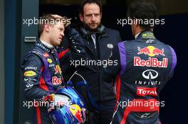 (L to R): pole sitter Sebastian Vettel (GER) Red Bull Racing with Matteo Bonciani (ITA) FIA Media Delegate and team mate Mark Webber (AUS) Red Bull Racing. 17.03.2013. Formula 1 World Championship, Rd 1, Australian Grand Prix, Albert Park, Melbourne, Australia, Race Day.