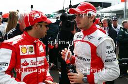 (L to R): Felipe Massa (BRA) Ferrari and Jules Bianchi (FRA) Marussia F1 Team on the drivers parade. 17.03.2013. Formula 1 World Championship, Rd 1, Australian Grand Prix, Albert Park, Melbourne, Australia, Race Day.