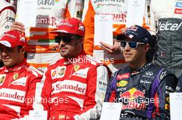 (L to R): Fernando Alonso (ESP) Ferrari and Sebastian Vettel (GER) Red Bull Racing at the drivers start of year photograph. 17.03.2013. Formula 1 World Championship, Rd 1, Australian Grand Prix, Albert Park, Melbourne, Australia, Race Day.