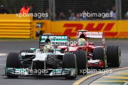 Nico Rosberg (GER) Mercedes AMG F1 W04 leads Felipe Massa (BRA) Ferrari F138. 17.03.2013. Formula 1 World Championship, Rd 1, Australian Grand Prix, Albert Park, Melbourne, Australia, Race Day.