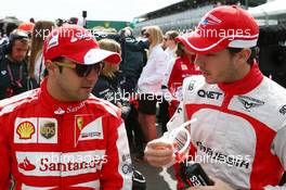 (L to R): Felipe Massa (BRA) Ferrari and Jules Bianchi (FRA) Marussia F1 Team on the drivers parade. 17.03.2013. Formula 1 World Championship, Rd 1, Australian Grand Prix, Albert Park, Melbourne, Australia, Race Day.