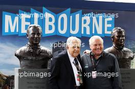 (L to R): Sir Jack Brabham (AUS) and fellow World Champion Alan Jones (AUS) with the statues unveiled in their honour. 17.03.2013. Formula 1 World Championship, Rd 1, Australian Grand Prix, Albert Park, Melbourne, Australia, Race Day.