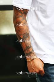 The tattooed arm of Lewis Hamilton (GBR) Mercedes AMG F1. 14.03.2013. Formula 1 World Championship, Rd 1, Australian Grand Prix, Albert Park, Melbourne, Australia, Preparation Day.