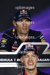 Mark Webber (AUS) Red Bull Racing and Sebastian Vettel (GER) Red Bull Racing in the FIA Press Conference. 14.03.2013. Formula 1 World Championship, Rd 1, Australian Grand Prix, Albert Park, Melbourne, Australia, Preparation Day.