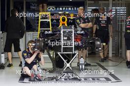 Red Bull Racing RB9 prepared in the pit garages. 14.03.2013. Formula 1 World Championship, Rd 1, Australian Grand Prix, Albert Park, Melbourne, Australia, Preparation Day.