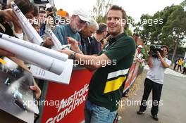 Giedo van der Garde (NLD) Caterham F1 Team signs autographs for the fans. 14.03.2013. Formula 1 World Championship, Rd 1, Australian Grand Prix, Albert Park, Melbourne, Australia, Preparation Day.