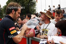 Jean-Eric Vergne (FRA) Scuderia Toro Rosso signs autographs for the fans. 14.03.2013. Formula 1 World Championship, Rd 1, Australian Grand Prix, Albert Park, Melbourne, Australia, Preparation Day.