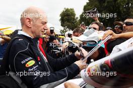 Adrian Newey (GBR) Red Bull Racing Chief Technical Officer signs autographs for the fans. 14.03.2013. Formula 1 World Championship, Rd 1, Australian Grand Prix, Albert Park, Melbourne, Australia, Preparation Day.