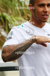 Lewis Hamilton (GBR) Mercedes AMG F1 and his tattoos on his arm. 14.03.2013. Formula 1 World Championship, Rd 1, Australian Grand Prix, Albert Park, Melbourne, Australia, Preparation Day.