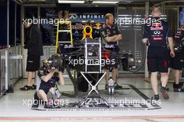 Red Bull Racing RB9 prepared in the pit garages. 14.03.2013. Formula 1 World Championship, Rd 1, Australian Grand Prix, Albert Park, Melbourne, Australia, Preparation Day.