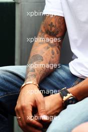 The tattooed arm of Lewis Hamilton (GBR) Mercedes AMG F1. 14.03.2013. Formula 1 World Championship, Rd 1, Australian Grand Prix, Albert Park, Melbourne, Australia, Preparation Day.