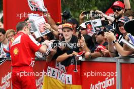 Stefano Domenicali (ITA) Ferrari General Director signs autographs for the fans. 14.03.2013. Formula 1 World Championship, Rd 1, Australian Grand Prix, Albert Park, Melbourne, Australia, Preparation Day.