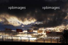 Flags as the sun sets. 14.03.2013. Formula 1 World Championship, Rd 1, Australian Grand Prix, Albert Park, Melbourne, Australia, Preparation Day.