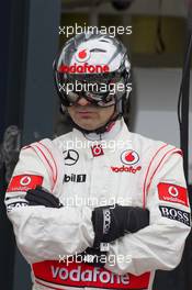 McLaren mechanic practices pit stops. 14.03.2013. Formula 1 World Championship, Rd 1, Australian Grand Prix, Albert Park, Melbourne, Australia, Preparation Day.