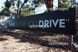 Anti drink drive banner featuring Bernie Ecclestone (GBR) CEO Formula One Group (FOM)  13.03.2013. Formula 1 World Championship, Rd 1, Australian Grand Prix, Albert Park, Melbourne, Australia, Preparation Day.