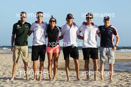 Rookie drivers on the beach (L to R): Giedo van der Garde (NLD) Caterham F1 Team; Max Chilton (GBR) Marussia F1 Team; Natalie Pinkham (GBR) Sky Sports Presenter; Esteban Gutierrez (MEX) Sauber; Jules Bianchi (FRA) Marussia F1 Team; Valtteri Bottas (FIN) Williams. 13.03.2013. Formula 1 World Championship, Rd 1, Australian Grand Prix, Albert Park, Melbourne, Australia, Preparation Day.