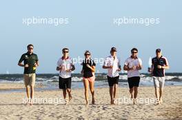 Rookie drivers on the beach (L to R): Giedo van der Garde (NLD) Caterham F1 Team; Max Chilton (GBR) Marussia F1 Team; Natalie Pinkham (GBR) Sky Sports Presenter; Esteban Gutierrez (MEX) Sauber; Jules Bianchi (FRA) Marussia F1 Team; Valtteri Bottas (FIN) Williams. 13.03.2013. Formula 1 World Championship, Rd 1, Australian Grand Prix, Albert Park, Melbourne, Australia, Preparation Day.