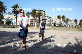 Jules Bianchi (FRA) Marussia F1 Team and Valtteri Bottas (FIN) Williams Team play beach tennis. 13.03.2013. Formula 1 World Championship, Rd 1, Australian Grand Prix, Albert Park, Melbourne, Australia, Preparation Day.