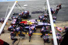 Mark Webber (AUS) Red Bull Racing RB9 practices a pit stop. 22.02.2013. Formula One Testing, Day Four, Barcelona, Spain.