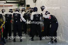 Williams mechanics warm up routine before practicing pit stops. 22.02.2013. Formula One Testing, Day Four, Barcelona, Spain.