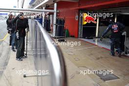 Photographers shoot into the Red Bull Racing pit garage. 21.02.2013. Formula One Testing, Day Three, Barcelona, Spain.