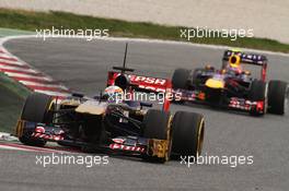 Jean-Eric Vergne (FRA) Scuderia Toro Rosso STR8 leads Mark Webber (AUS) Red Bull Racing RB9. 21.02.2013. Formula One Testing, Day Three, Barcelona, Spain.