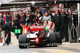 Jenson Button (GBR) McLaren MP4-28 in the pits. 01.03.2013. Formula One Testing, Day Two, Barcelona, Spain.