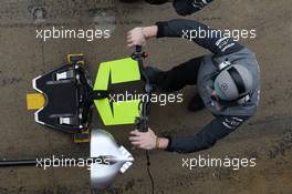 Mercedes AMG F1 mechanic with front pit stop jack. 01.03.2013. Formula One Testing, Day Two, Barcelona, Spain.