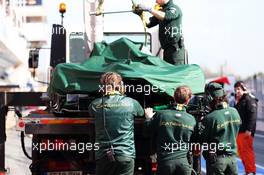 Caterham CT03 of Giedo van der Garde (NLD) Caterham is recovered back to the pits on the back of a truck. 02.03.2013. Formula One Testing, Day Three, Barcelona, Spain.