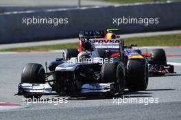 Pastor Maldonado (VEN) Williams FW35 leads Mark Webber (AUS) Red Bull Racing RB9. 02.03.2013. Formula One Testing, Day Three, Barcelona, Spain.