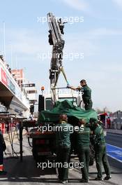 Caterham CT03 of Giedo van der Garde (NLD) Caterham is recovered back to the pits on the back of a truck. 02.03.2013. Formula One Testing, Day Three, Barcelona, Spain.