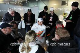 Adrian Sutil (GER) Sahara Force India F1 with the media. 28.02.2013. Formula One Testing, Day One, Barcelona, Spain.