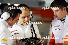 Gianpiero Lambiase (ITA) Sahara Force India F1 Engineer (Centre) with Paul di Resta (GBR) Sahara Force India F1 (Right). 28.02.2013. Formula One Testing, Day One, Barcelona, Spain.