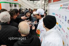 Adrian Sutil (GER) Sahara Force India F1 with the media. 28.02.2013. Formula One Testing, Day One, Barcelona, Spain.