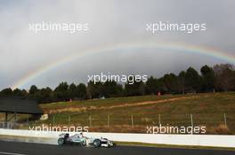 Lewis Hamilton (GBR) Mercedes AMG F1 W04 passes a rainbow. 28.02.2013. Formula One Testing, Day One, Barcelona, Spain.