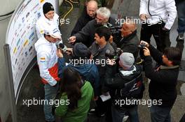 Adrian Sutil (GER) Sahara Force India F1 with the media following the confirmation of  his seat with the team in 2013. 28.02.2013. Formula One Testing, Day One, Barcelona, Spain.