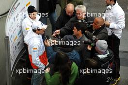 Adrian Sutil (GER) Sahara Force India F1 with the media following the confirmation of  his seat with the team in 2013. 28.02.2013. Formula One Testing, Day One, Barcelona, Spain.