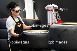 Pirelli tyre technician. 23.08.2013. Formula 1 World Championship, Rd 11, Belgian Grand Prix, Spa Francorchamps, Belgium, Practice Day.