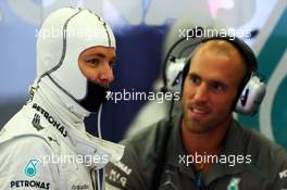 Nico Rosberg (GER) Mercedes AMG F1 with Daniel Schloesser (GER) Mercedes AMG F1 Physio. 23.08.2013. Formula 1 World Championship, Rd 11, Belgian Grand Prix, Spa Francorchamps, Belgium, Practice Day.