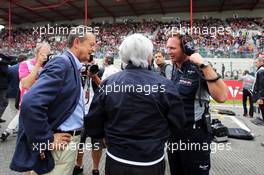 Bernie Ecclestone (GBR) CEO Formula One Group (FOM) and Christian Horner (GBR) Red Bull Racing Team Principal on the grid. 25.08.2013. Formula 1 World Championship, Rd 11, Belgian Grand Prix, Spa Francorchamps, Belgium, Race Day.