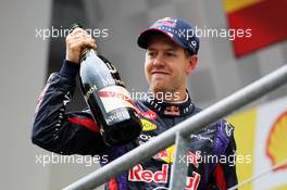 Race winner Sebastian Vettel (GER) Red Bull Racing celebrates on the podium. 25.08.2013. Formula 1 World Championship, Rd 11, Belgian Grand Prix, Spa Francorchamps, Belgium, Race Day.