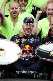 Race winner Sebastian Vettel (GER) Red Bull Racing celebrates with the team. 25.08.2013. Formula 1 World Championship, Rd 11, Belgian Grand Prix, Spa Francorchamps, Belgium, Race Day.