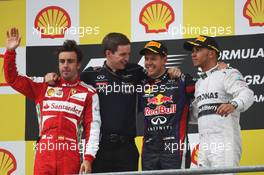 The podium (L to R): Fernando Alonso (ESP) Ferrari, second; Sebastian Vettel (GER) Red Bull Racing, race winner; Lewis Hamilton (GBR) Mercedes AMG F1, third. 25.08.2013. Formula 1 World Championship, Rd 11, Belgian Grand Prix, Spa Francorchamps, Belgium, Race Day.