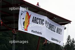 Greenpeace make a protest against race title sponsors Shell on the roof of the main grandstand. 25.08.2013. Formula 1 World Championship, Rd 11, Belgian Grand Prix, Spa Francorchamps, Belgium, Race Day.