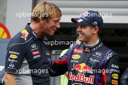 Race winner Sebastian Vettel (GER) Red Bull Racing celebrates with the team. 25.08.2013. Formula 1 World Championship, Rd 11, Belgian Grand Prix, Spa Francorchamps, Belgium, Race Day.