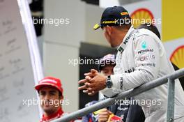 Lewis Hamilton (GBR) Mercedes AMG F1 on the podium. 25.08.2013. Formula 1 World Championship, Rd 11, Belgian Grand Prix, Spa Francorchamps, Belgium, Race Day.