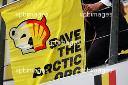 Greenpeace make a protest against race title sponsors Shell at the podium. 25.08.2013. Formula 1 World Championship, Rd 11, Belgian Grand Prix, Spa Francorchamps, Belgium, Race Day.